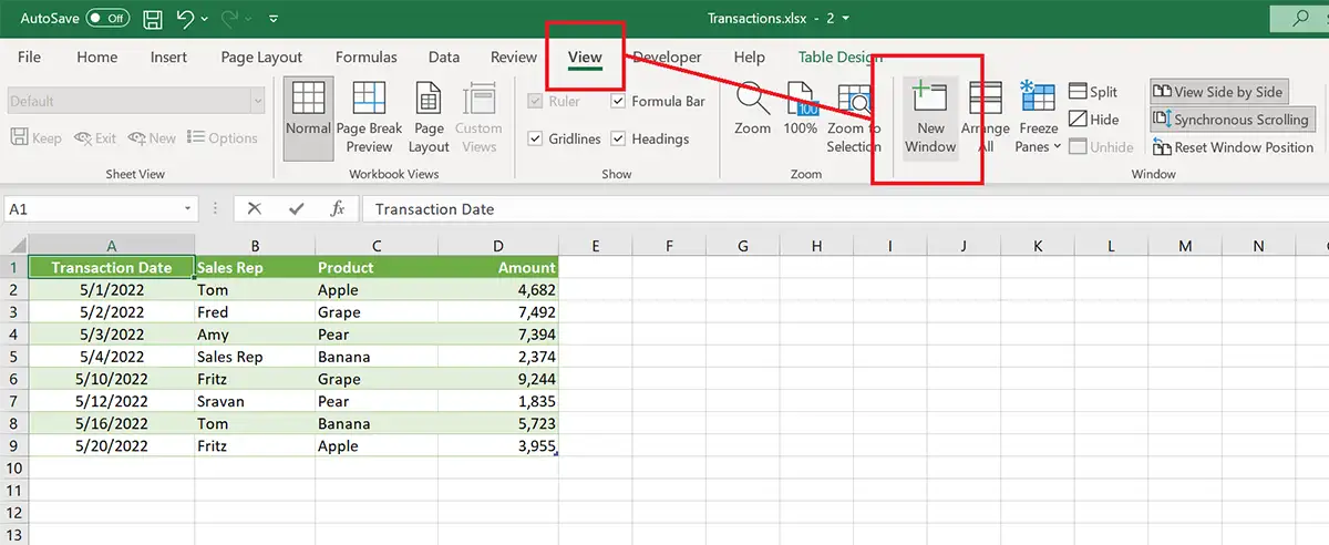 Use New Window command to compare two Excel files